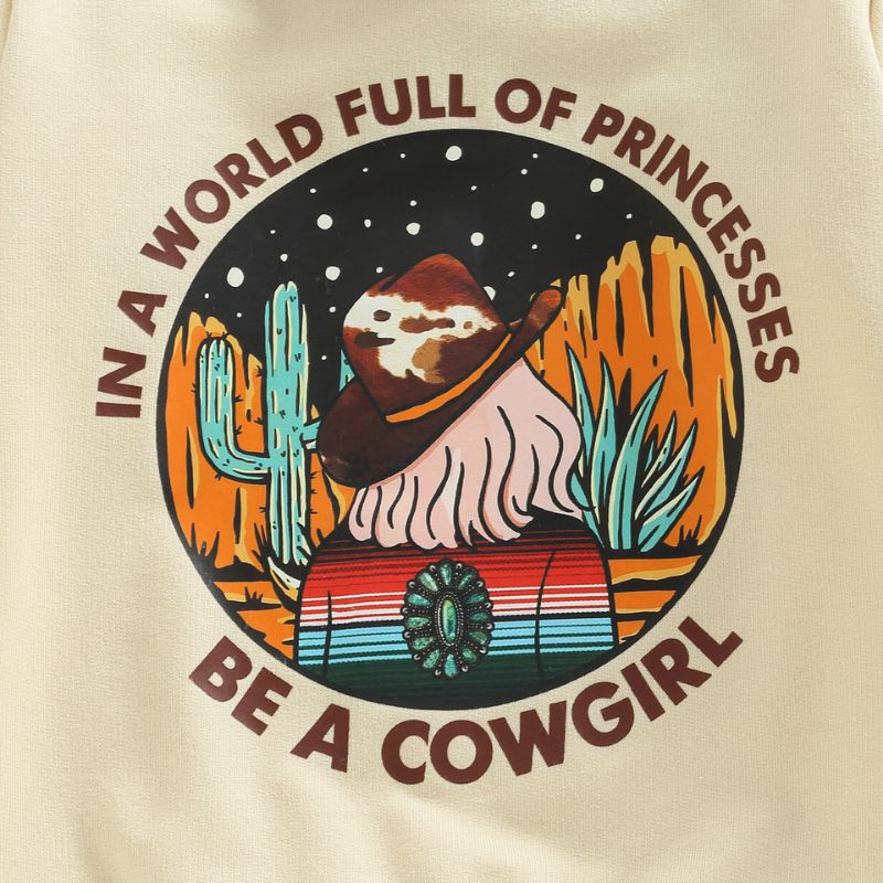 A close up of the print on Little Girl In A World Full Of Princessess Sweatshirt 
