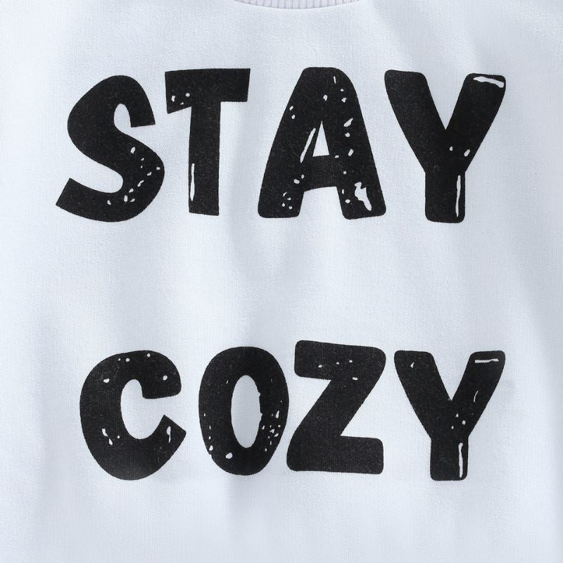 Up close of letter print in Stay Cozy Baby Sweatshirt