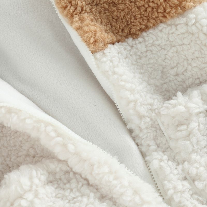 Close up of zipper and interior lining on Teddy Zipper Baby Jacket